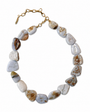 A tumbled stone necklace made of irregular, polished pebble-shaped beads in shades of gray, beige, and white with natural brown matrix patterns, finished with a gold-tone clasp.