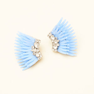 Light Blue Sequin Wing Stud Earrings with Clear Crystals on Tan Background