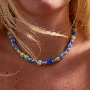 Beaded Heart and Fish Necklace on Models Neck