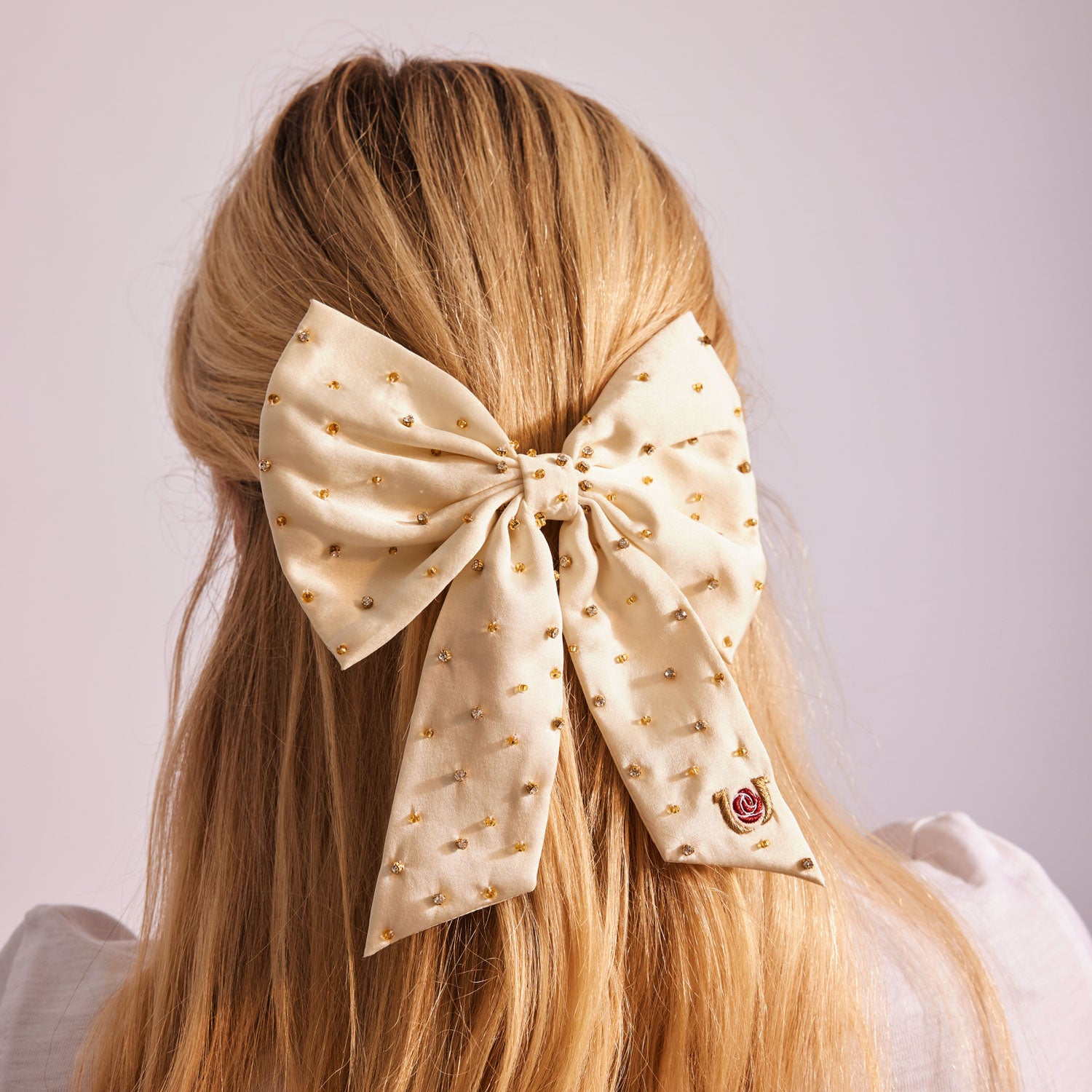 Champagne Silk and Crystal Embroidered Hair Bow Styled on Model