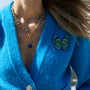 Green Butterfly Beaded and Embroidered Brooch on Mignonne Gavigan styled on a blue cardigan 2