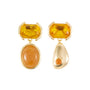 Pair of earrings with yellow and orange stones on a white background