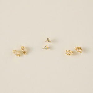 Clear and Champagne Crystal Studs On Tan Background