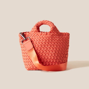 Coral Woven Neoprene Handbag on Flat Cream Background