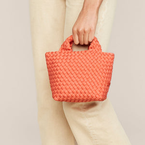 Coral Woven Neoprene Handbag Styled with Model in Cream Jeans