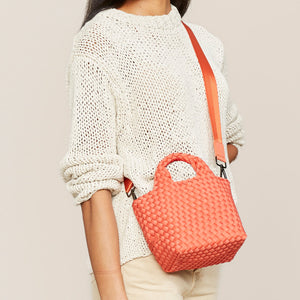 Coral Woven Neoprene Handbag Styled on Model in Cream Sweater