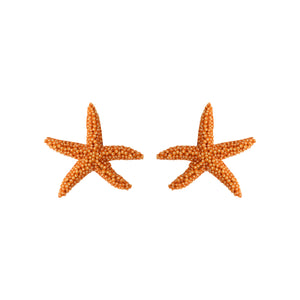 Beaded Orange Starfish Earrings on Flat White Background