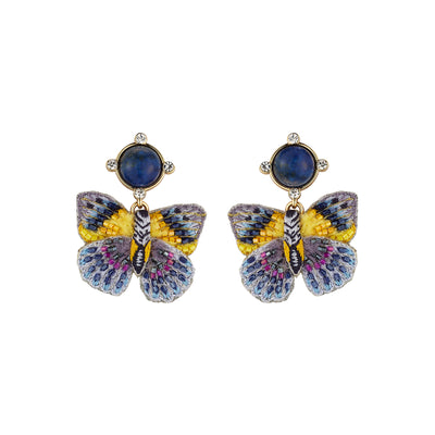 A pair of butterfly-shaped stud earrings with blue oval stones at the top and wings in yellow, purple, and blue enamel on a white background.