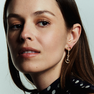 Gold and Crystal Horse Bit Drop Earrings Styled on Model