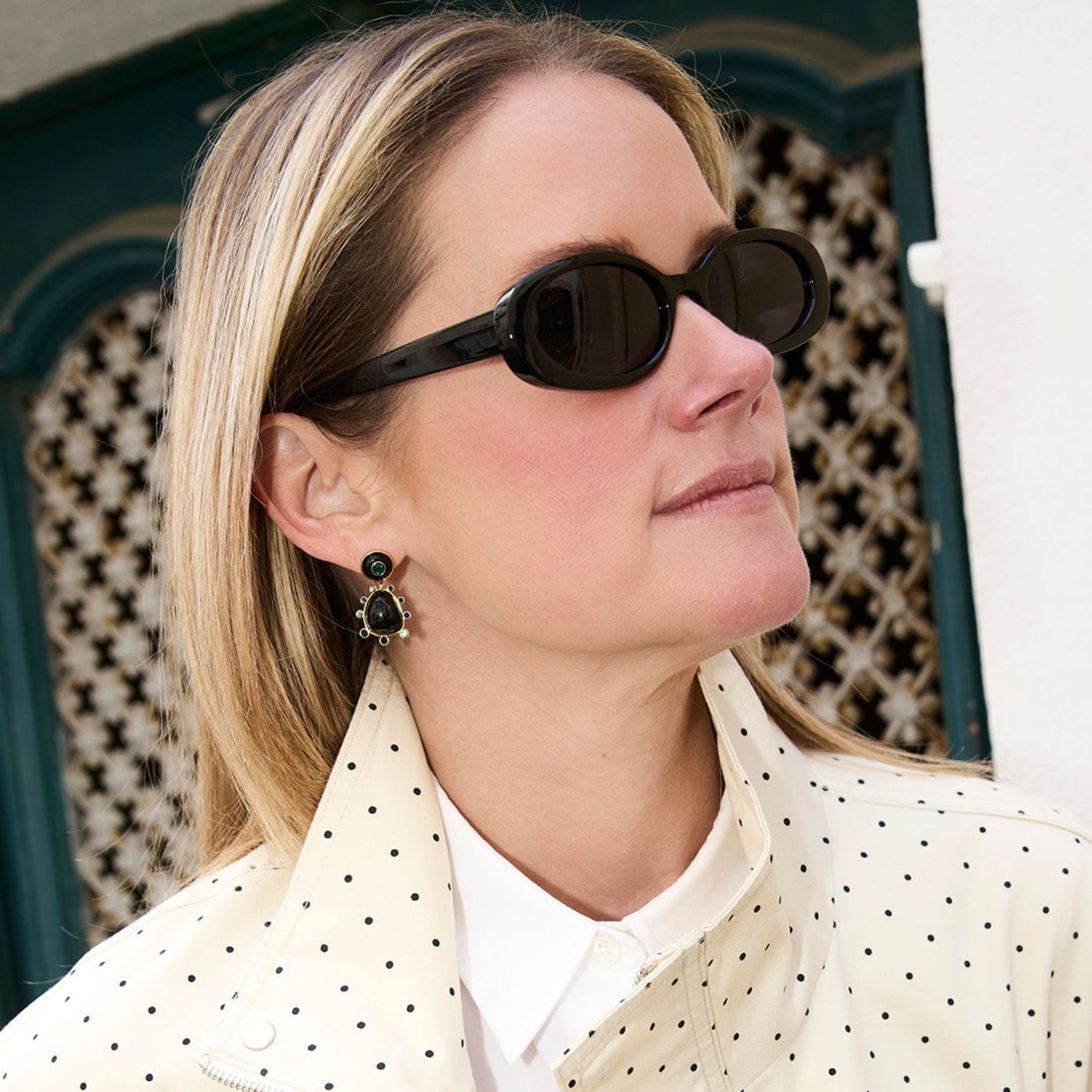 Semi Precious Black Onyx, Statement Earrings with Green and Blue Cubic Zirconia embellished drop dangle statement earrings with gold hardware on Mignonne Gavigan LifeStyle Closer