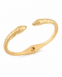 A gold snake-head bangle bracelet on a clean white background. The open cuff is designed like two snakes facing each other, with detailed scales and a small dark stone for each eye.