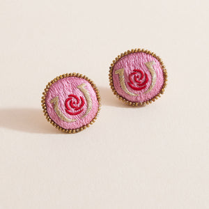 Pink, Gold, and Red Beaded and Embroidered Stud Earrings on Cream Background