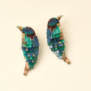 Emerald Green, Gold, and Bronze Sequin and Bead Embroidered Bird Earrings on Tan Background