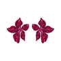 Magenta flower-shaped statement earrings featuring layered petals and intricate beadwork on white