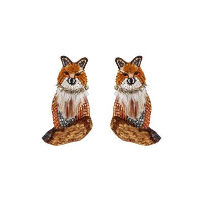 A pair of fox-shaped earrings crafted with orange and brown sequins, white faux fur details, and rhinestone embellishments on a plain white background.