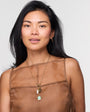 Model wearing Frances Charm Necklace