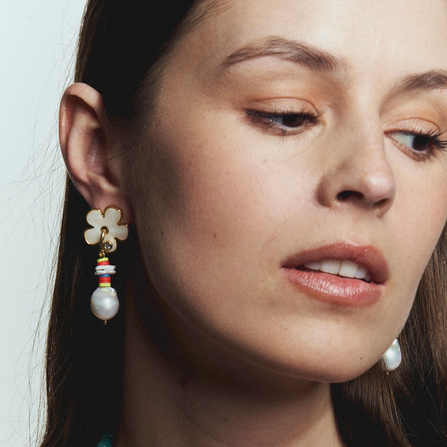 Flower and Multi Bead Pearl Drop Earrings Styled on Model