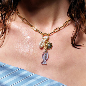 Fish, Shell, and Flower Charm Pendant Necklace Styled on Model