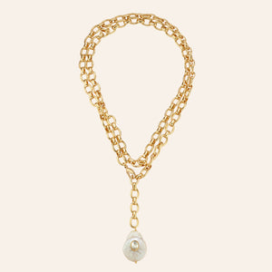 Freshwater Pearl and Crystal Gold Chain Wrap Pendant Necklace on Tan Background
