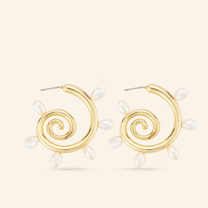 Freshwater Pearl and Gold Swirl Hoops on Cream Background