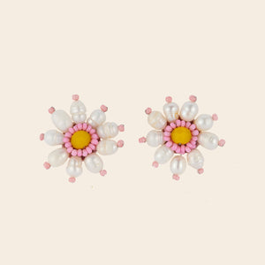 Freshwater Pearl and Yellow and Pink Beaded Flower Stud Earrings on Tan Background