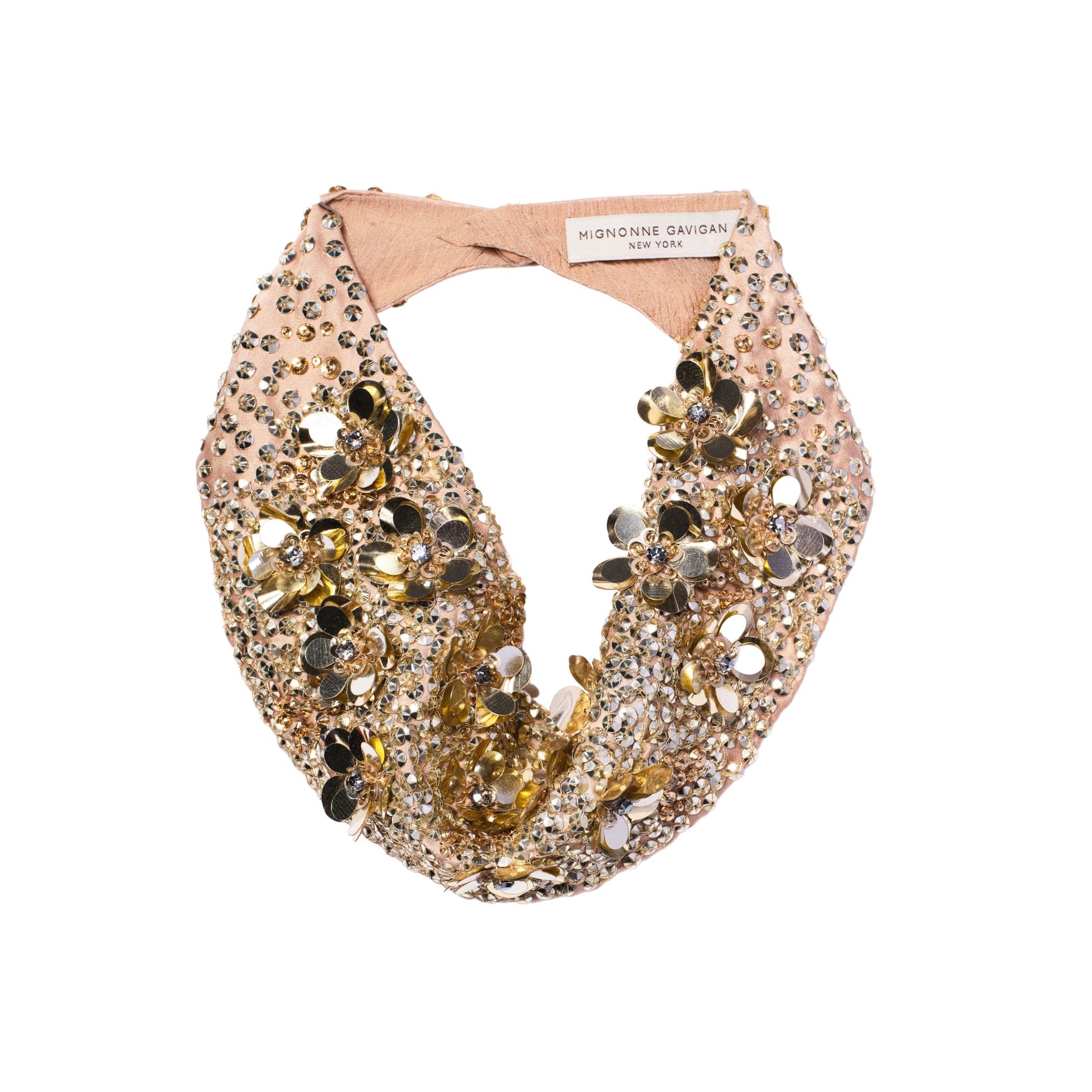 Decorative scarf necklace with gold floral embellishments on a white background
