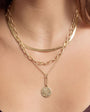 Gold Compass Pendant Necklace, Gold Herringbone Necklace, and Gold Chain Necklace Styled on Model