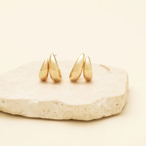 Gold Double Hoop Earrings Staged on Stone