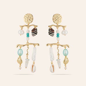 Charm Chandelier Drop Earrings on Cream Background