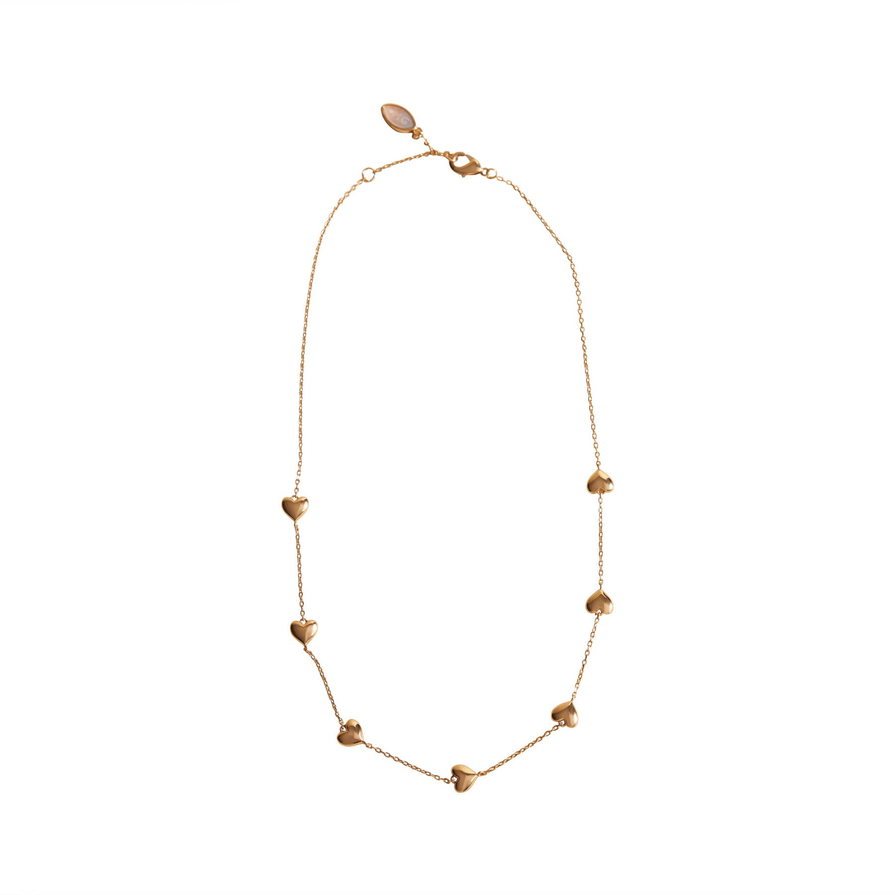 Gold Puffy Heart Chain Necklace on Flat White Background