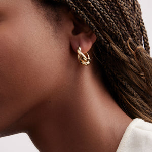 Twisted Gold Hoop Earrings Styled on Model