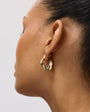 Organic Shaped Gold Hoop Earrings Styled on Model