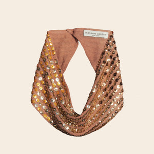 Gold Sequin and Bead Embroidered Scarf Necklace on Tan Background
