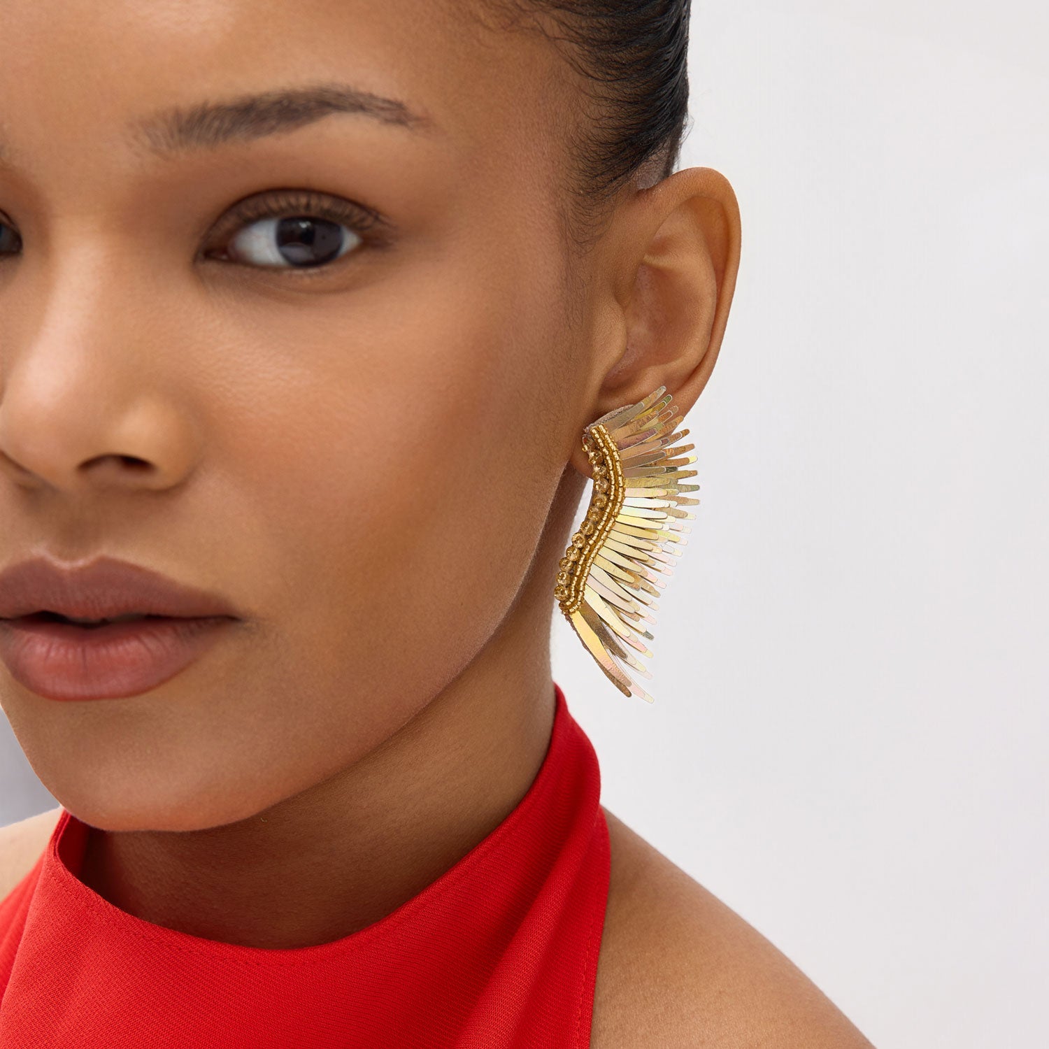 Gold Sequin Wing Stud Earrings Styled on Model