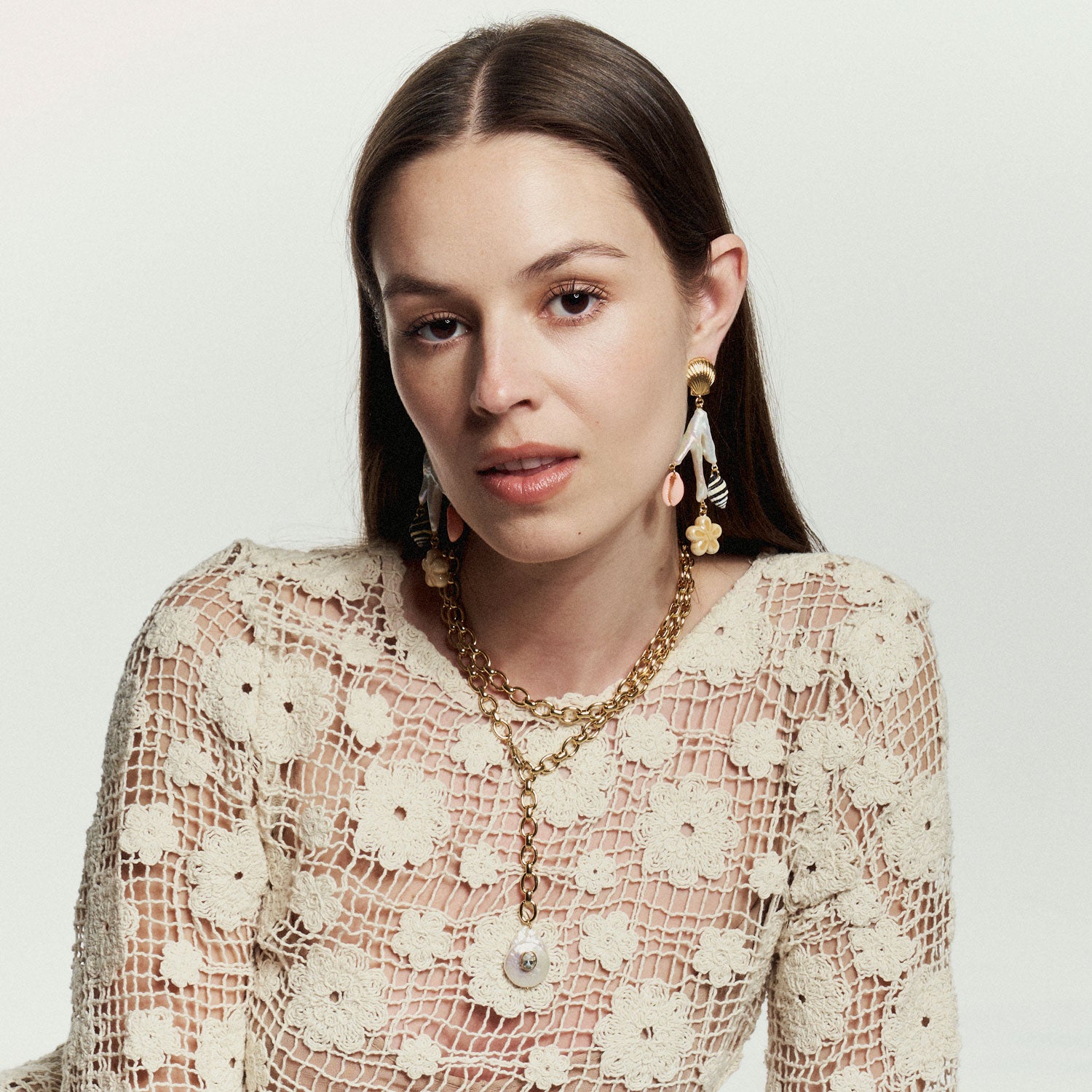 Gold, Freshwater Pearl, and Shell Charm Drop Earrings Styled on Model