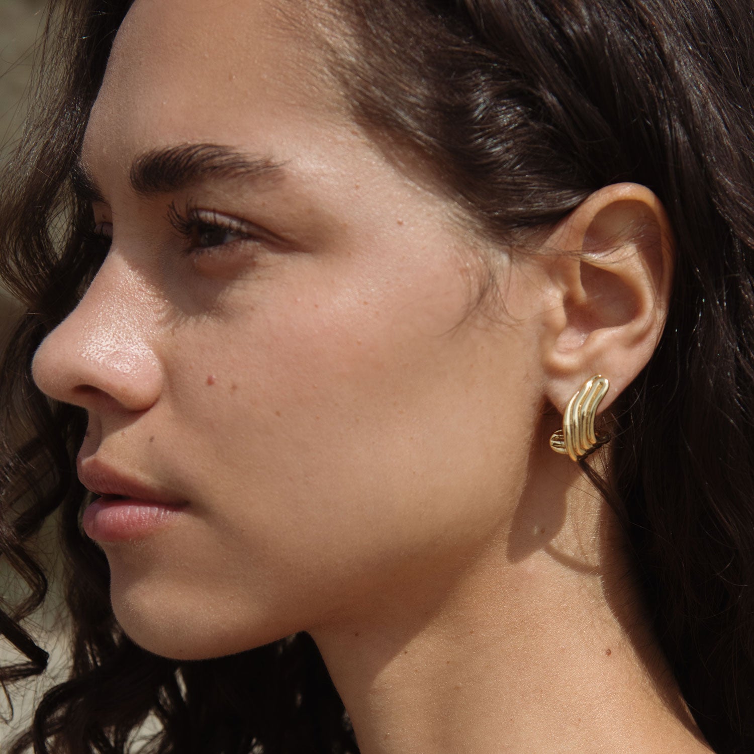 Gold Stud Earrings Styled on Model
