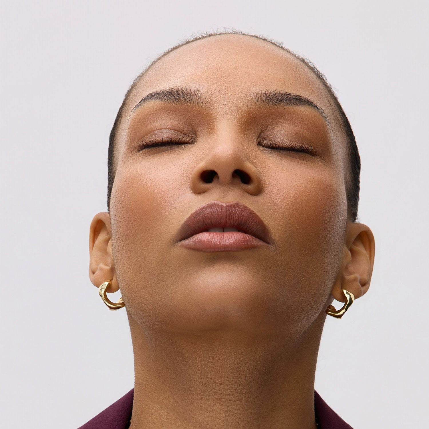 Gold Stud Earrings Styled on Model