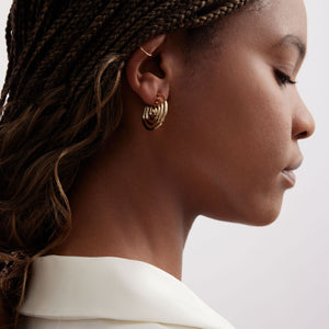 Gold Swirly Hoop Earrings Styled on Model