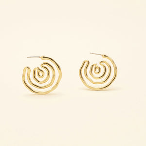 Swirly Gold Hoops on Cream Background