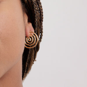 Gold Swirly Hoop Earrings Styled on Model