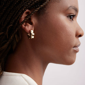 Gold Wavy Hoop Earrings on Model