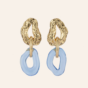 Gold and Blue Double Drop Earrings on Tan Background