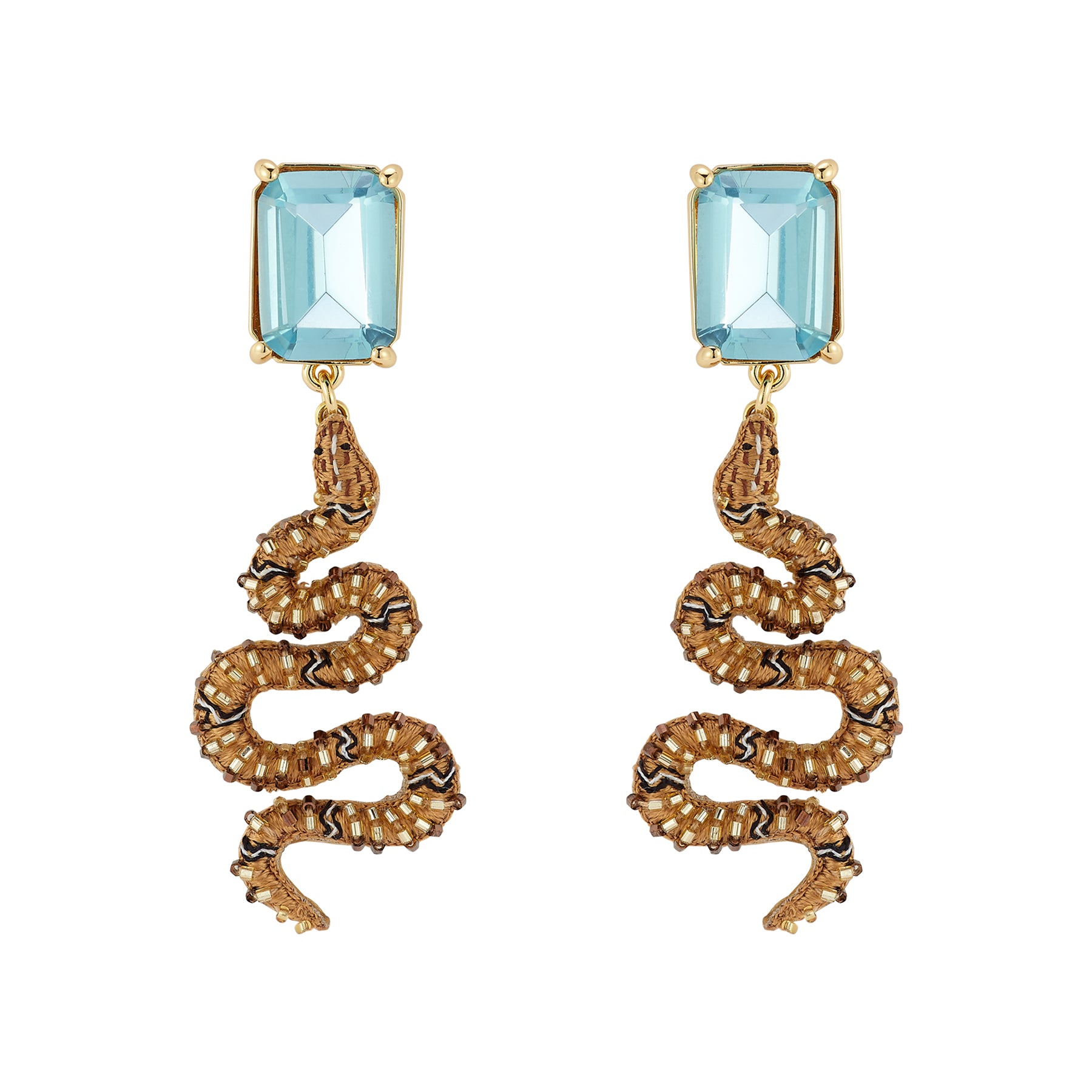 Snake-shaped earrings with blue gemstones on a white background