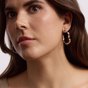 Gold and Crystal Hoop Earrings on Model