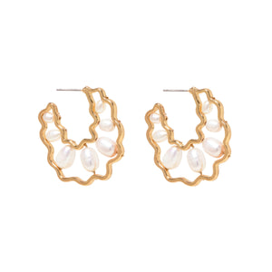Gold and Freshwater Pearl Hoop Earrings on Flat White Background