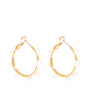Gold and Multi-Sized White Pearl Hoop Earrings On Flat White Background
