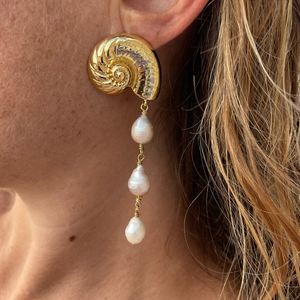 Gold Shell and Pearl Dangle Earrings on Model's Ear