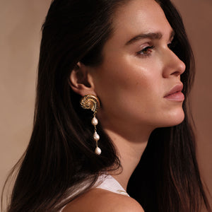 Gold Shell and Pearl Dangle Earrings Styled on Model