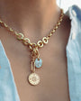 Compass and Evil Eye Charm Necklace on Model 