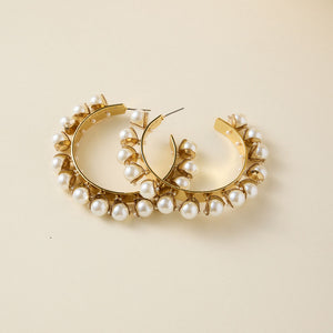 Gold and Pearl Hoops on Cream Background